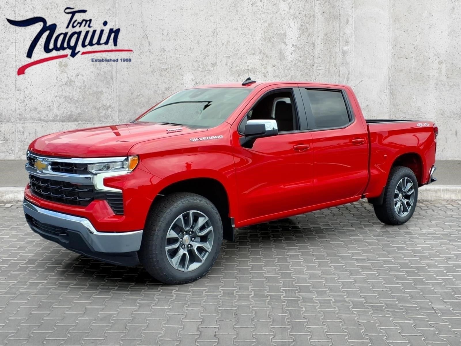 2026 Chevrolet Silverado 1500 LT (2FL) in Red Hot — front three-quarter view