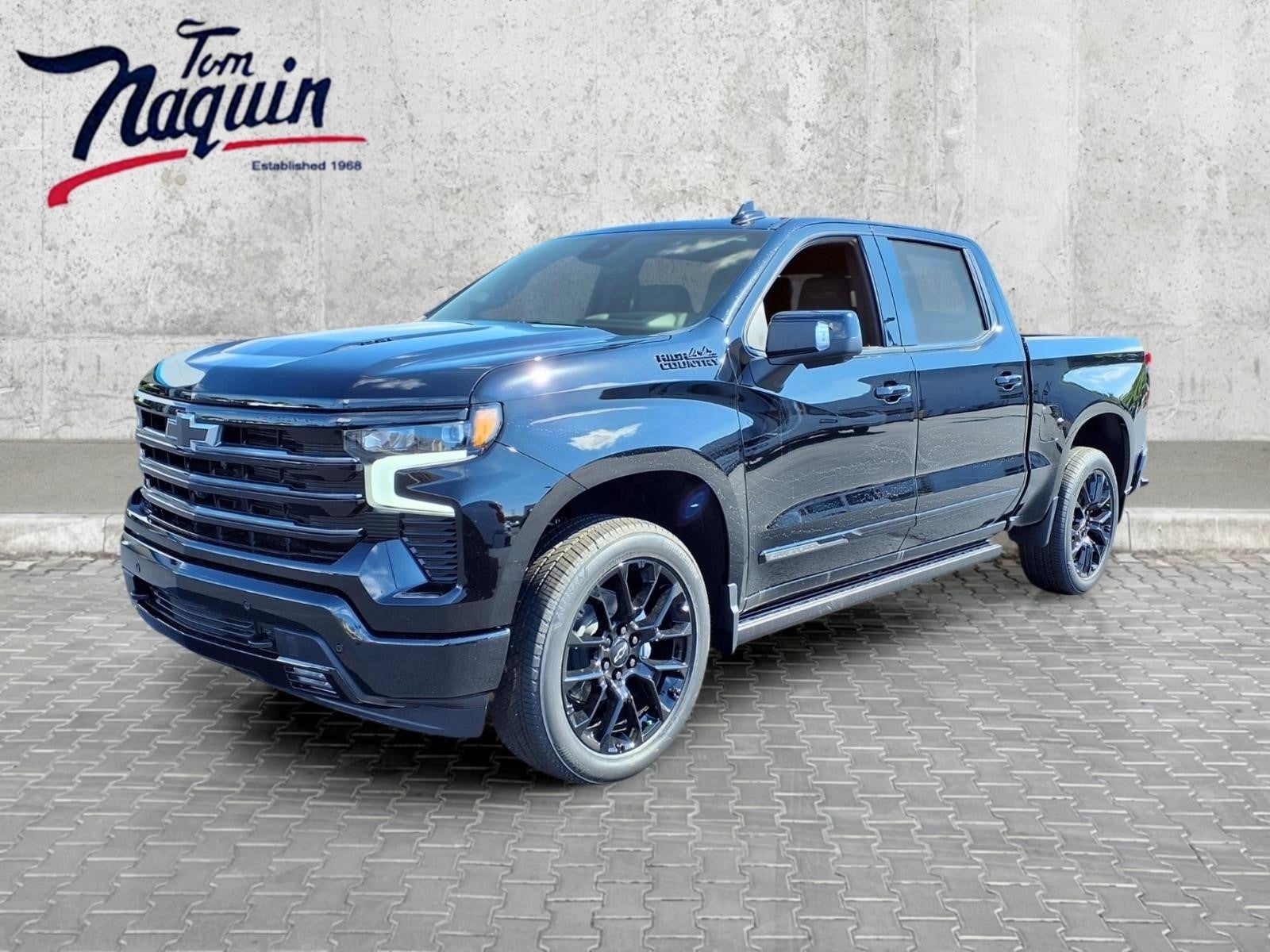2026 Chevrolet Silverado 1500 High Country in Black — front three-quarter view