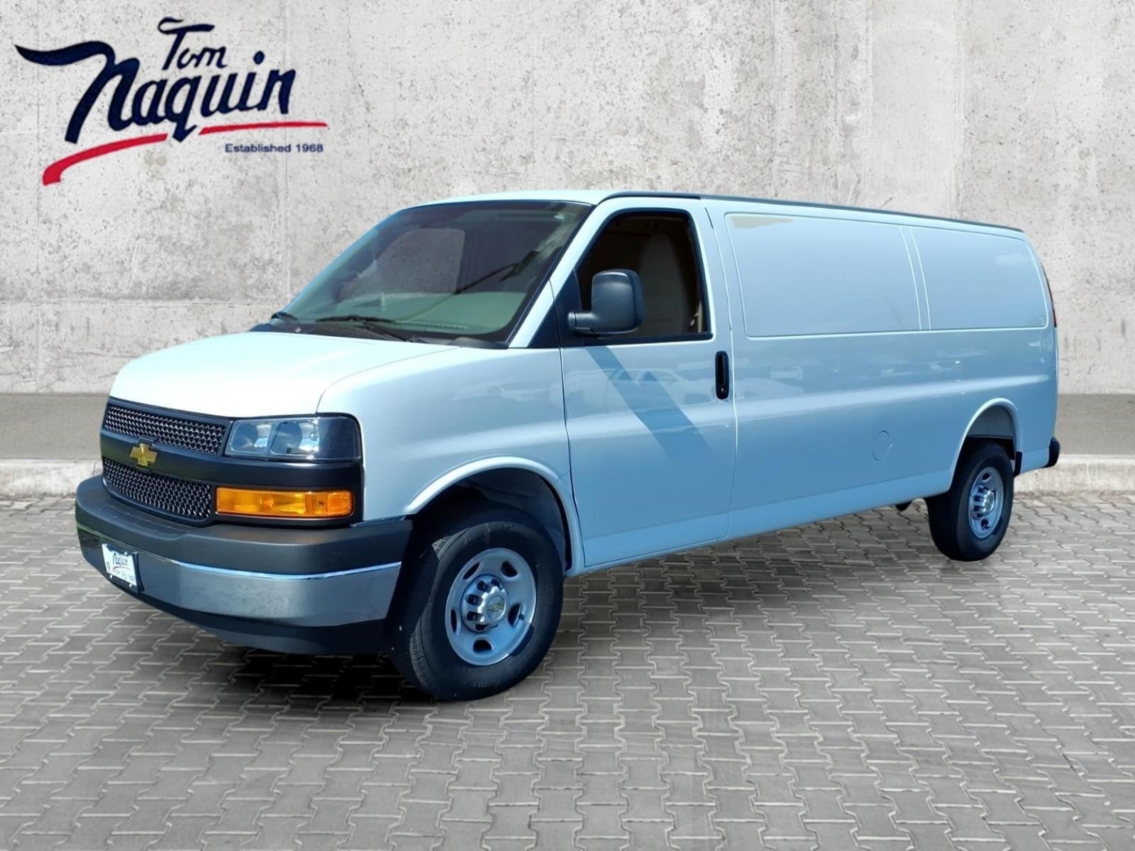 2026 Chevrolet Express Cargo WT in Summit White — front three-quarter view