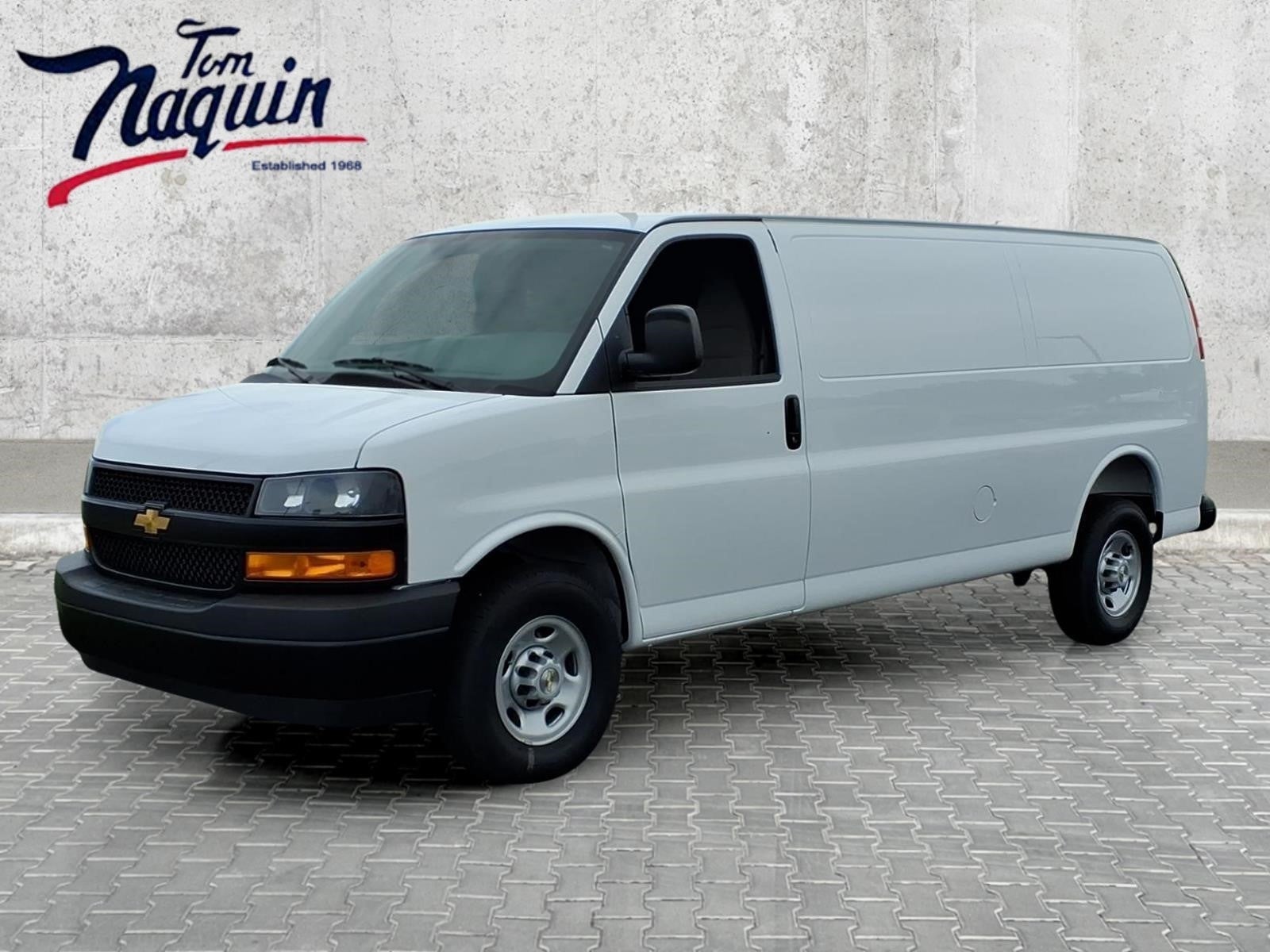 2026 Chevrolet Express Cargo WT in Summit White — front three-quarter view