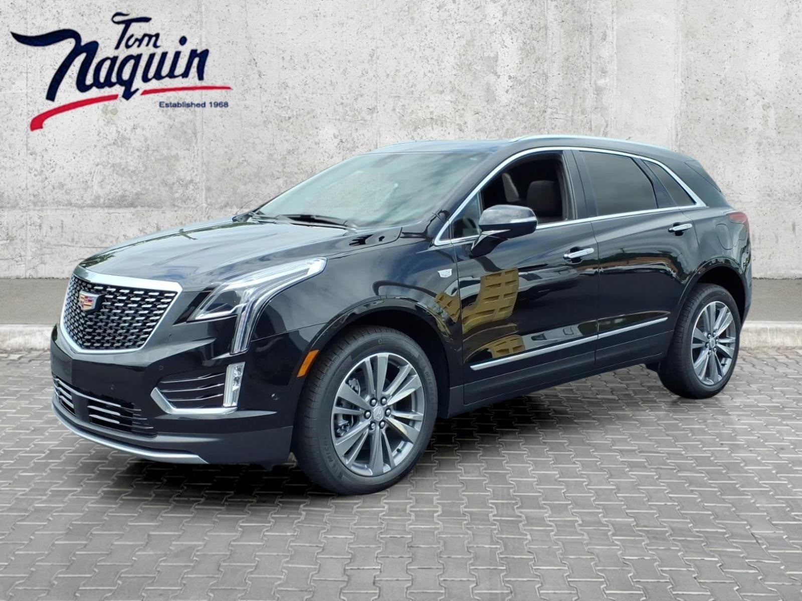 2026 Cadillac XT5 Premium Luxury in Stellar Black Metallic — front three-quarter view