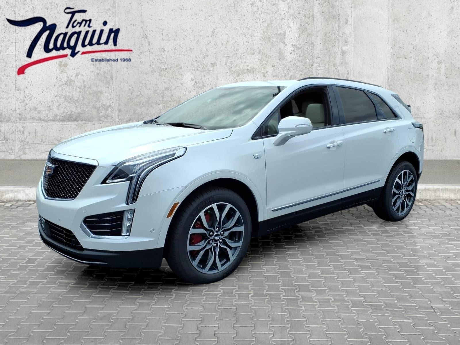 2026 Cadillac XT5 Sport in Crystal White Tricoat — front three-quarter view