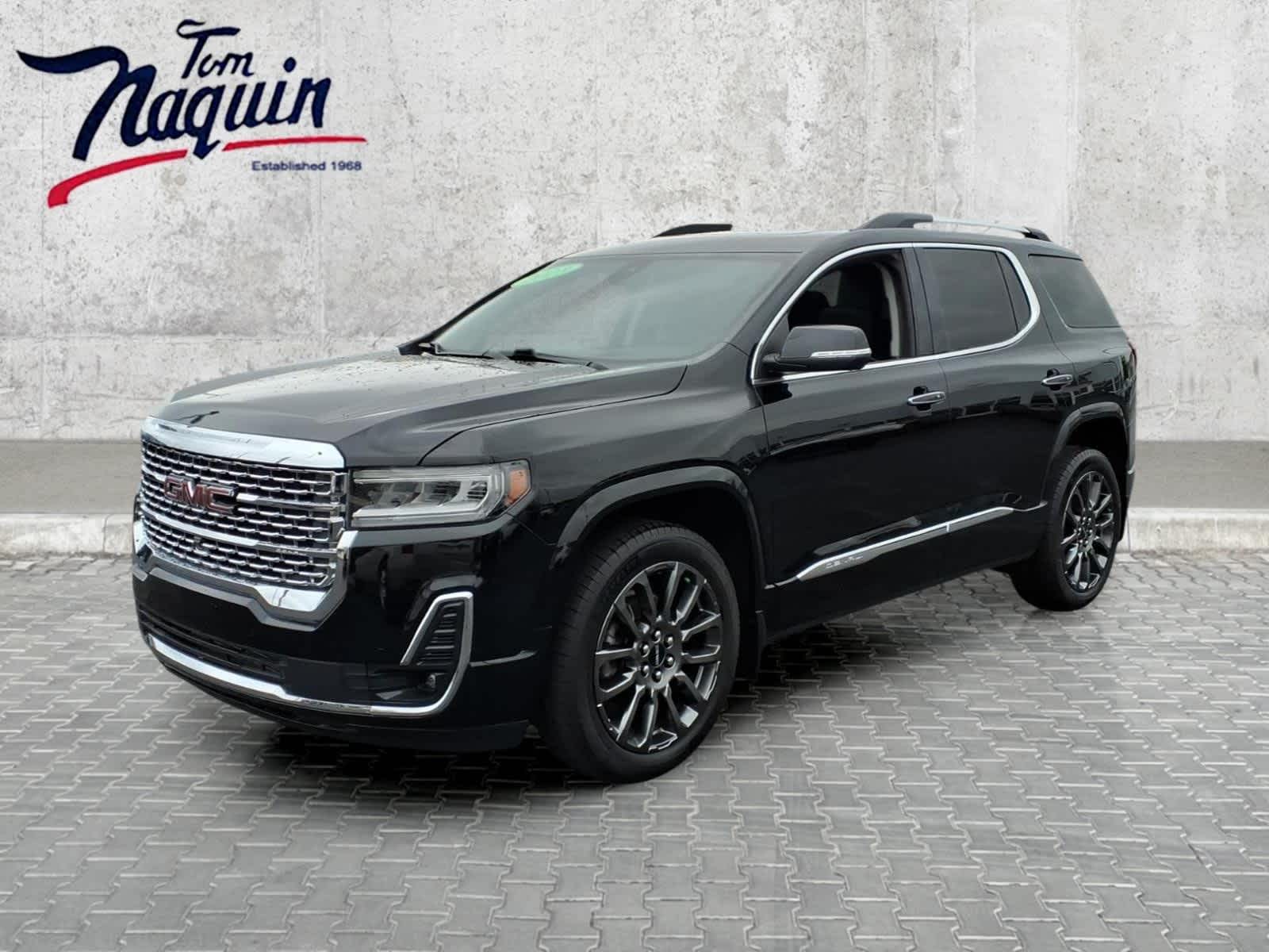 2023 GMC Acadia Denali in Black — front three-quarter view