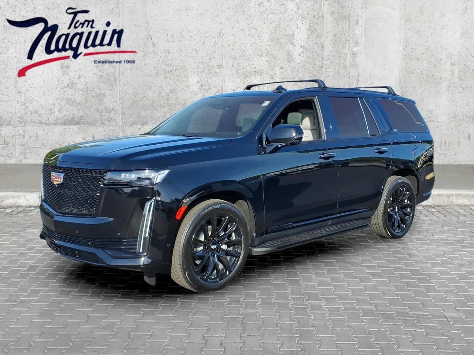 2022 Cadillac Escalade Sport in Black Raven — front three-quarter view