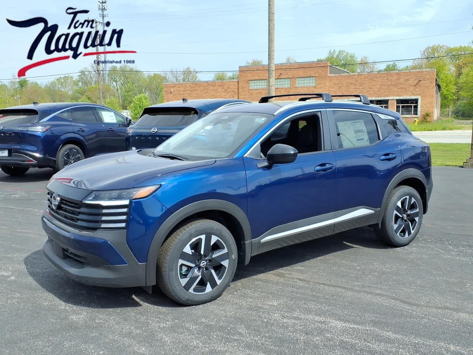 2026 Nissan Kicks SV in Deep Blue Pearl — front three-quarter view