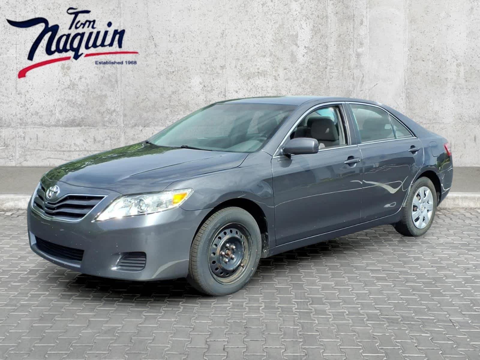 2010 Toyota Camry LE in Magnetic Gray Metallic — front three-quarter view