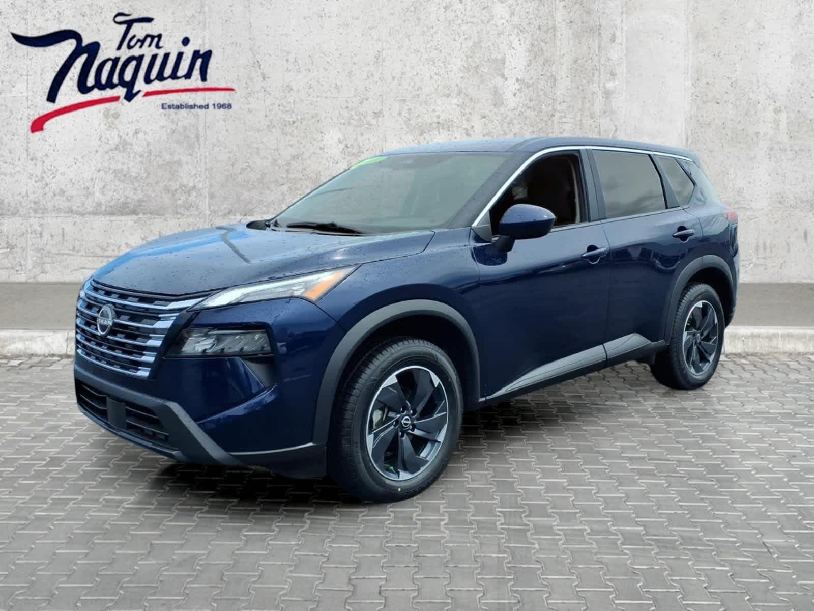 2025 Nissan Rogue SV in Deep Ocean Blue Pearl — front three-quarter view