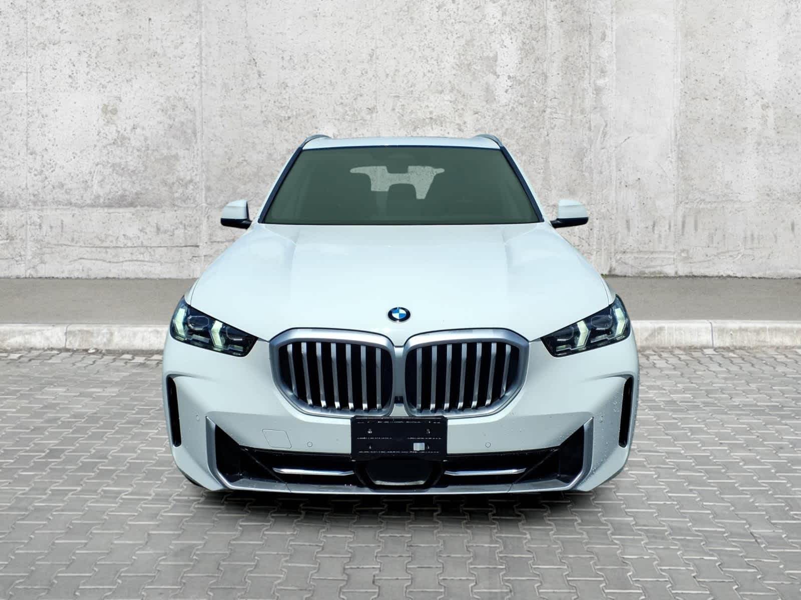 2026 BMW X5 xDrive40i — rear three-quarter view