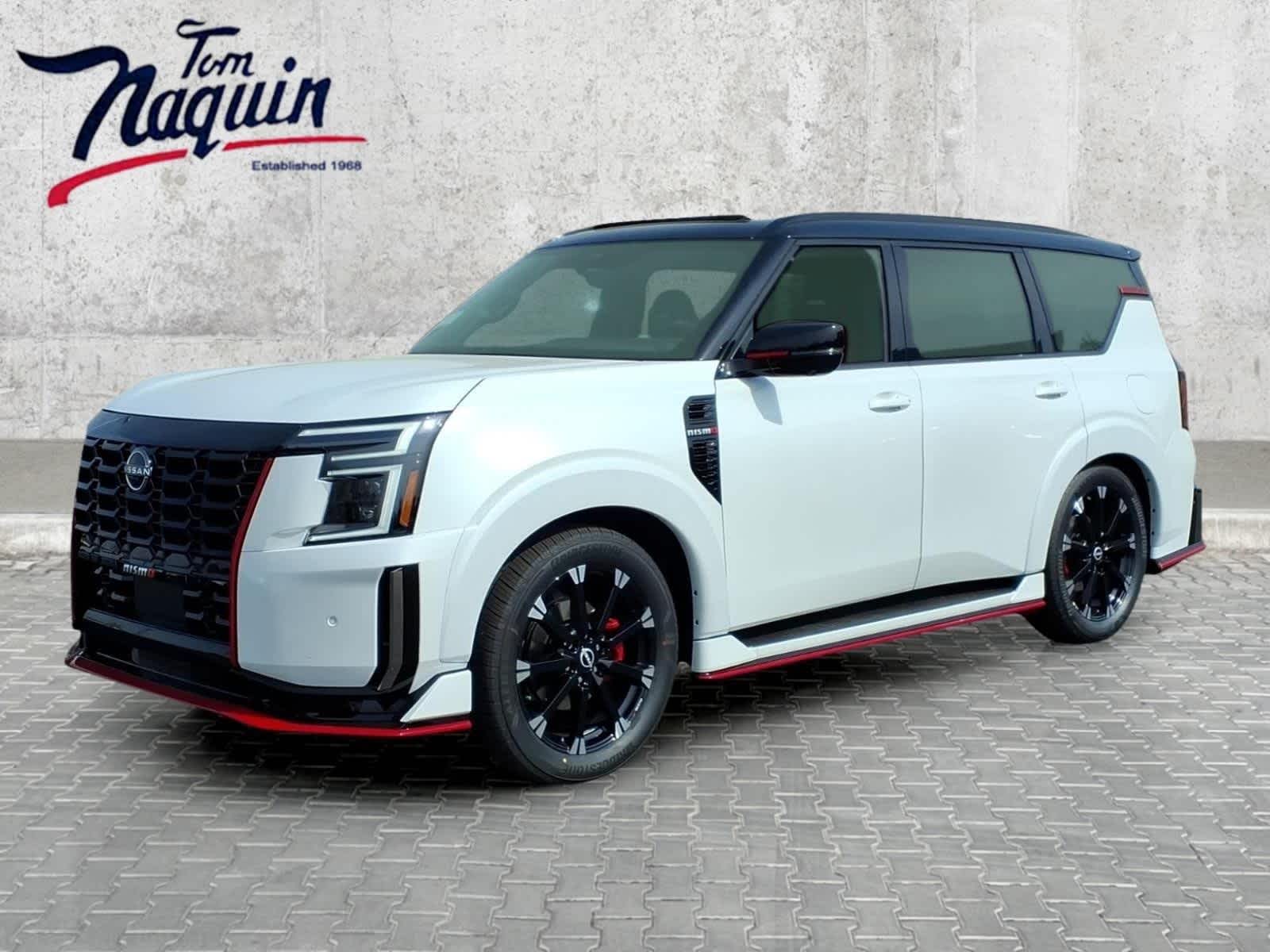 2026 Nissan Armada NISMO in Everest White Pearl Tricoat/Super Black — front three-quarter view