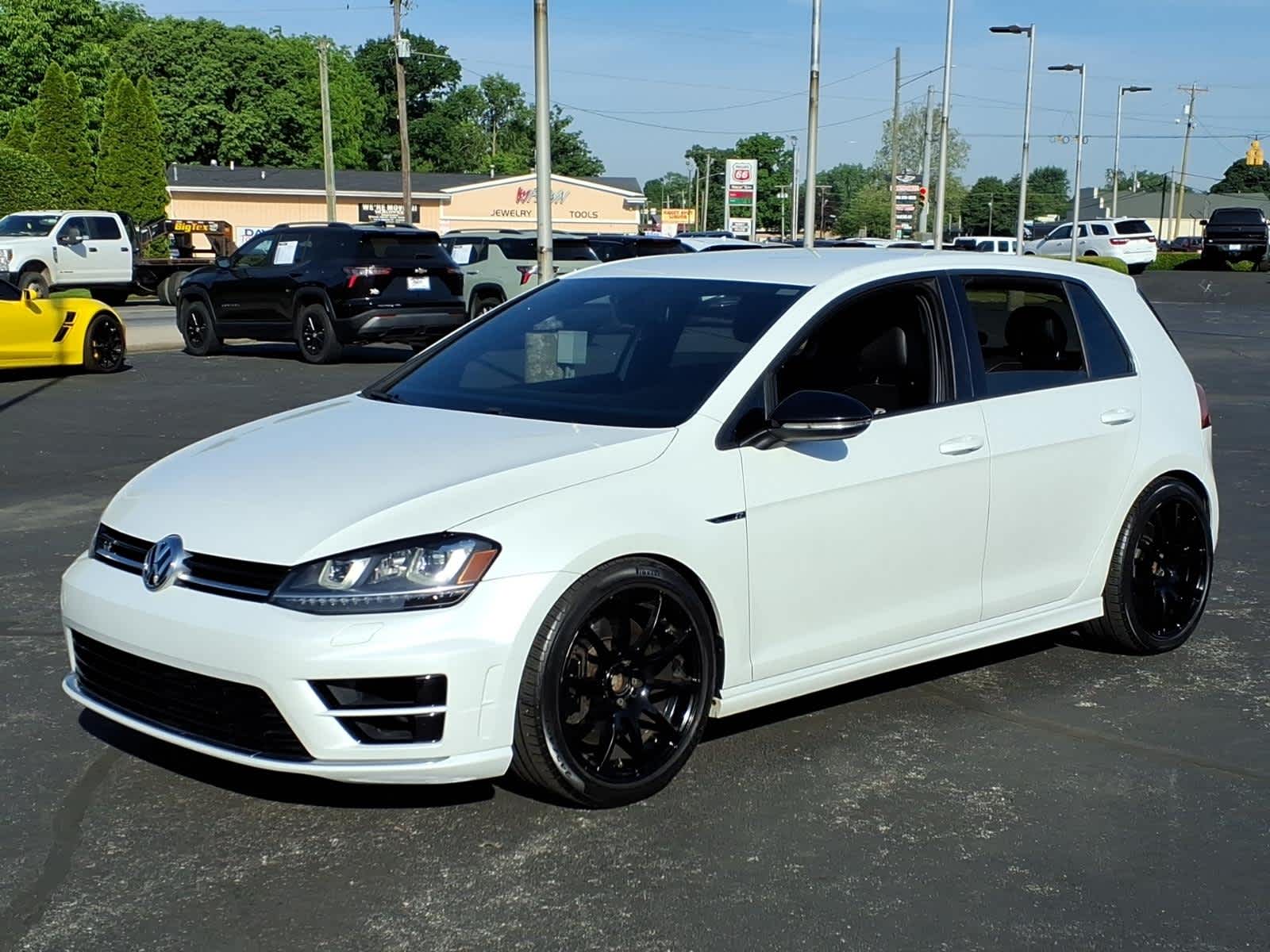 2016 Volkswagen Golf R Base in White — front three-quarter view
